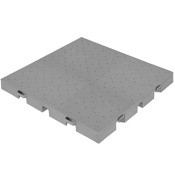 An EverBlock Flooring silver plastic drainage top with holes.