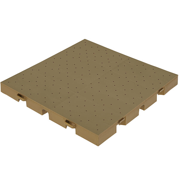 A brown plastic square with holes in it.