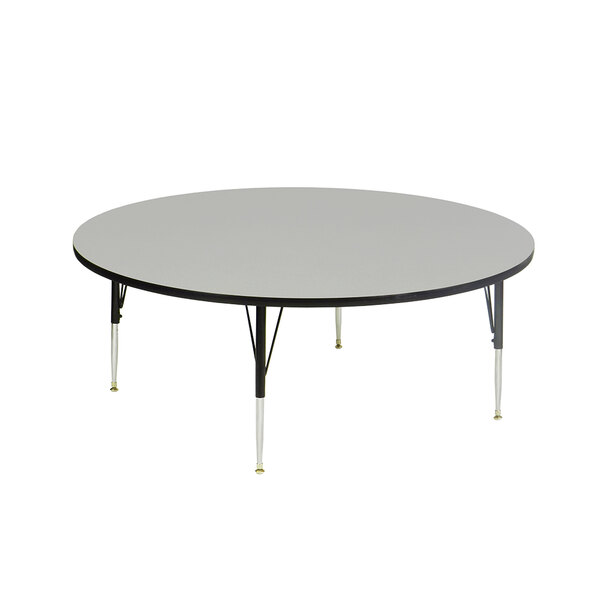 A Correll round activity table with black legs and a gray top.