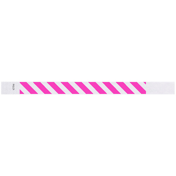 A neon pink and white striped Carnival King wristband.