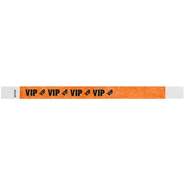 A neon orange Tyvek wristband with the word "VIP" in black.