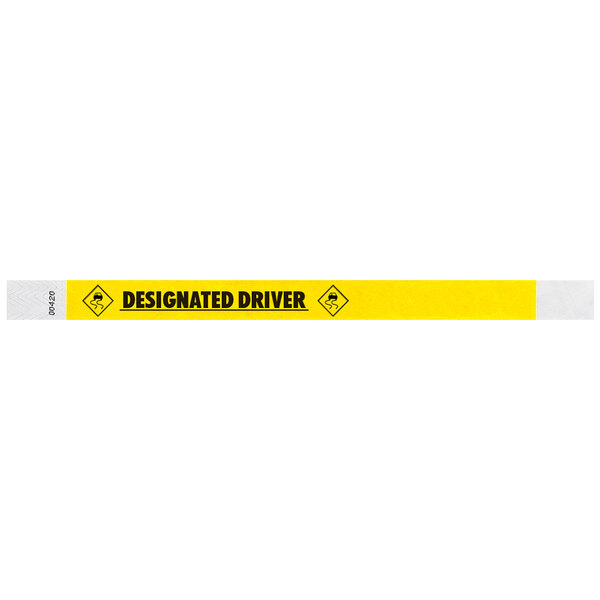 A yellow and white striped Tyvek wristband with black text that says "DESIGNATED DRIVER"