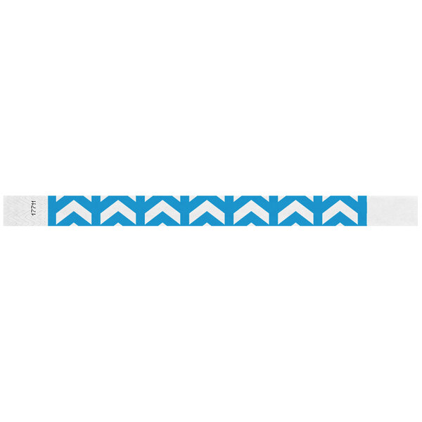 A blue and white Carnival King wristband with white arrow designs.
