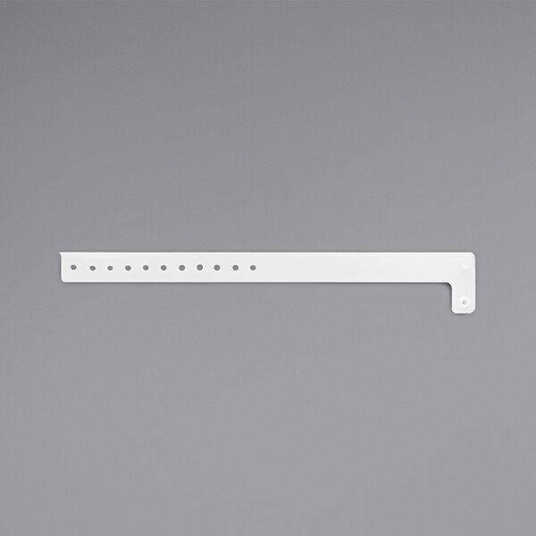 A white rectangular plastic wristband with holes.