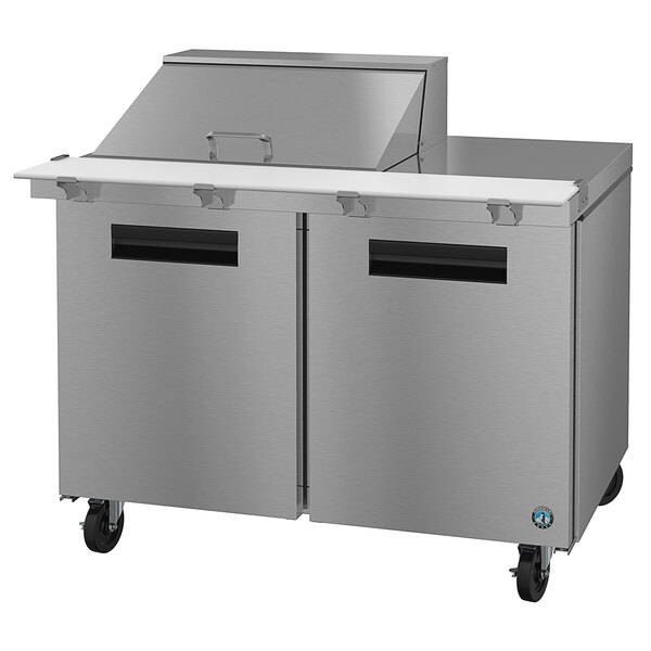 A Hoshizaki stainless steel 2 door refrigerated sandwich prep table.
