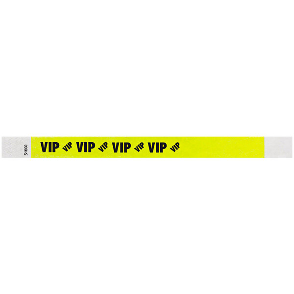 A yellow Carnival King wristband with "VIP" in black text.