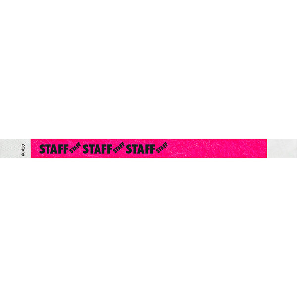 A white Carnival King wristband with a pink border and the word "STAFF" in black text.