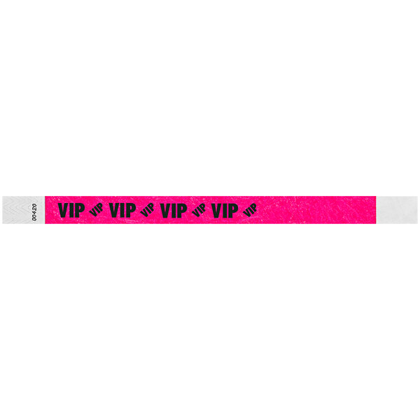 A neon pink wristband with "VIP" in black text.