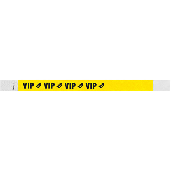 A yellow wristband with a yellow and white strip and black text that says "VIP"