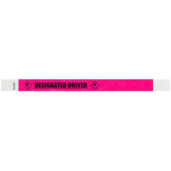 A neon pink and white Carnival King Tyvek wristband with black text that says "DESIGNATED DRIVER"