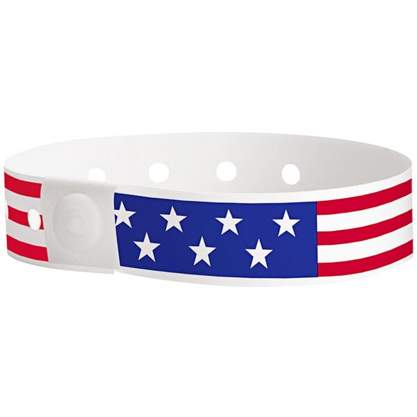 A white wristband with red, white, and blue stars and stripes.