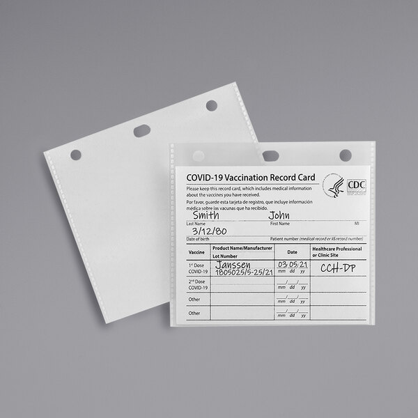 A close-up of a clear C-Line COVID-19 vaccine card holder with a vaccination record card inside.