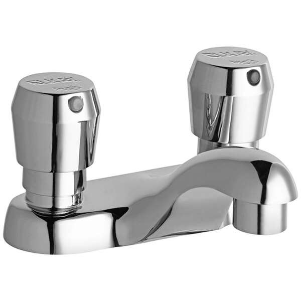 An Elkay chrome deck-mount faucet with push button handles.