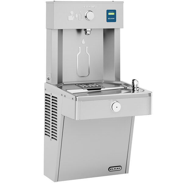 An Elkay stainless steel chilled water bottle filling station with a water bottle on top.