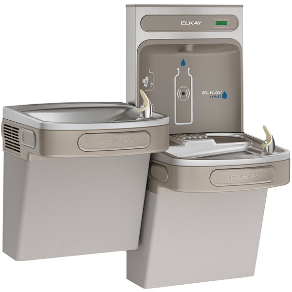 An Elkay light gray bi-level drinking fountain with a water bottle filling station and two faucets.