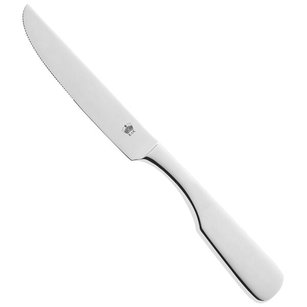 A RAK Porcelain stainless steel dinner knife with a white handle.