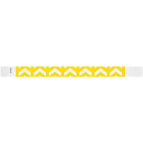 A yellow and white wristband with upward pointing arrows.