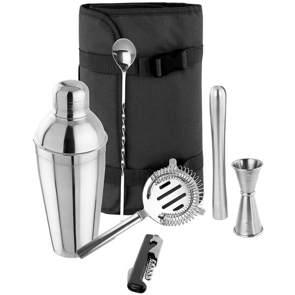 A Franmara Deluxe cocktail kit with a silver shaker, strainer, and other accessories in a roll-up case.