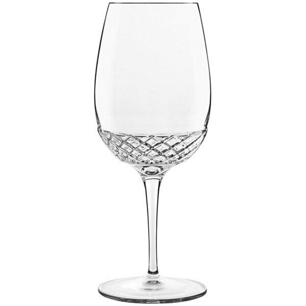A close-up of a Luigi Bormioli Roma wine glass with a clear rim.
