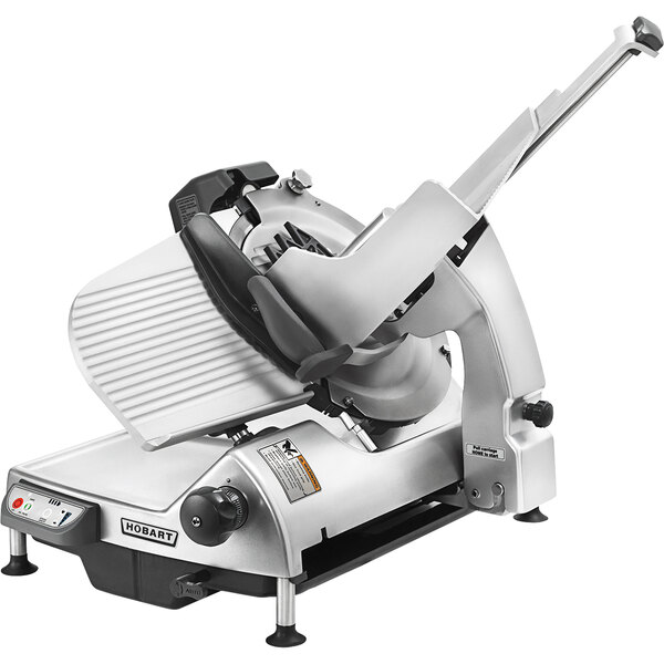 A Hobart automatic meat slicer with a blade on top.