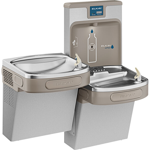 An Elkay light gray bi-level water fountain and bottle filling station with two faucets.