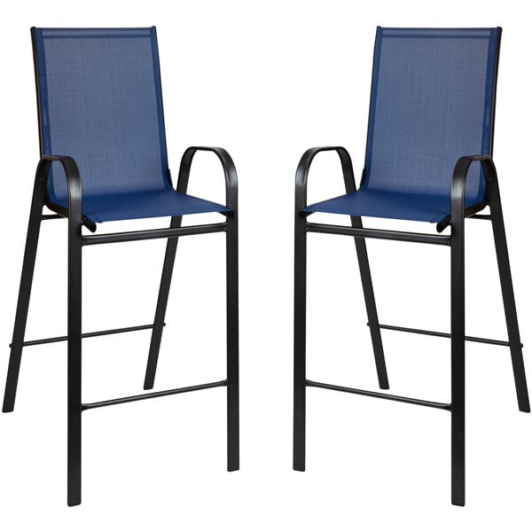 Two navy blue Flash Furniture barstools with black frames.