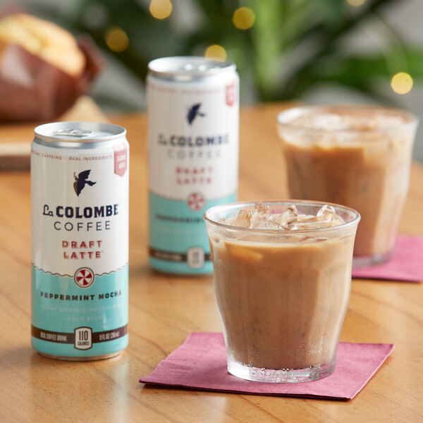 Two cans of La Colombe Peppermint Mocha Latte on a table.