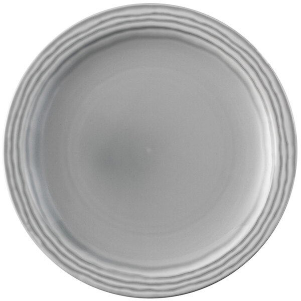 A close-up of a Dudson Harvest Norse white china plate with a thin rim.