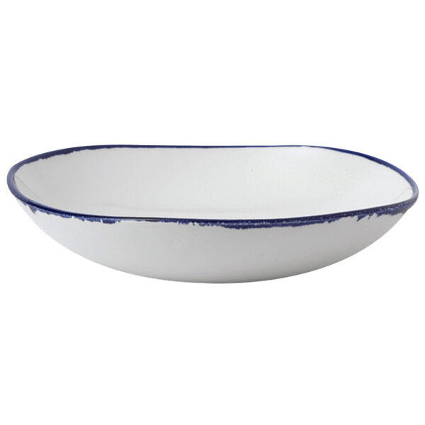 A white Dudson china bowl with a blue rim.