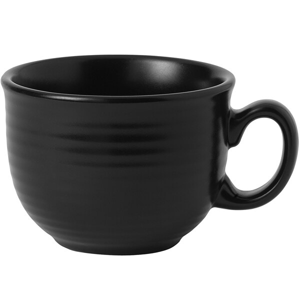 A Dudson matte jet black stoneware cafe au lait cup with a handle.