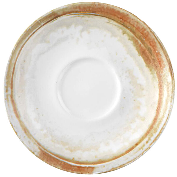 A Dudson Maker's Finca sandstone saucer with a brown rim and circle on it.