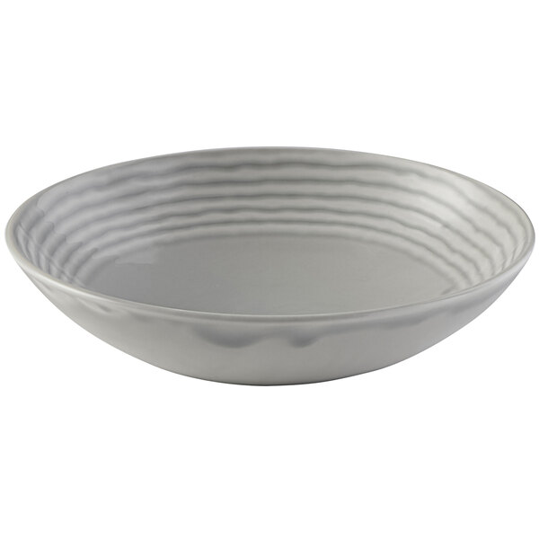 A Dudson Harvest Norse grey coupe china bowl with wavy lines.