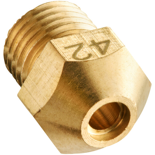 A brass orifice with a gold nut and the number 7 on it.
