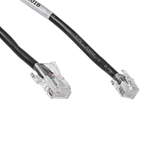 A close-up of a black and white APG MultiPro interface cable.