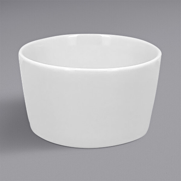A RAK Porcelain white bowl on a gray surface.
