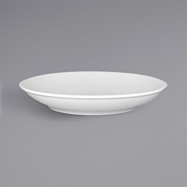 A white RAK Porcelain deep coupe plate.