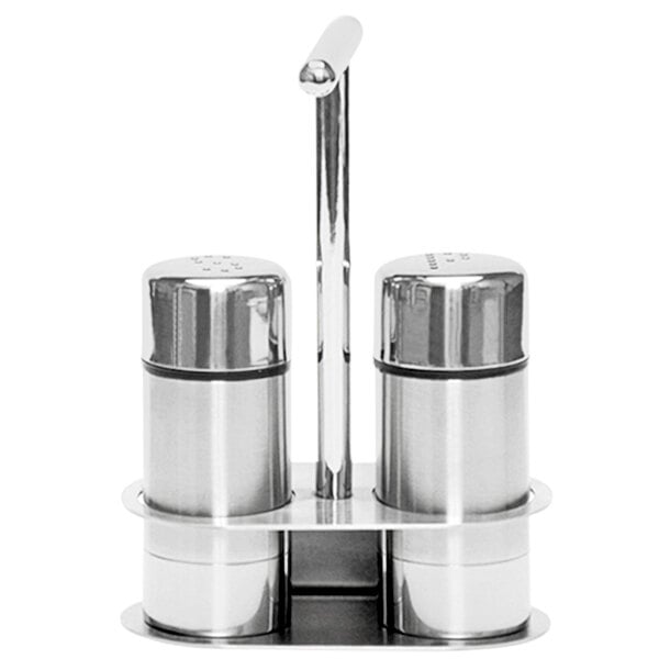 A silver Fortessa salt and pepper shaker set with base.