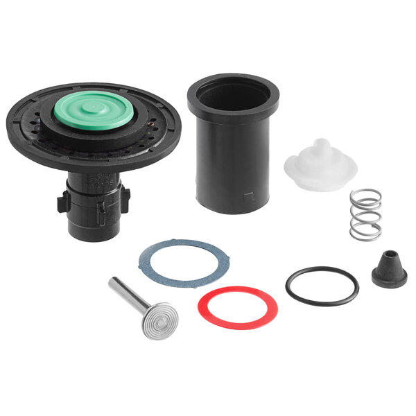 A black and green Sloan Regal plumbing kit with metal and rubber parts.