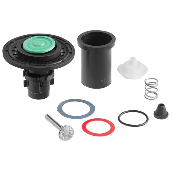 A black and green Sloan Regal rebuild kit for a urinal with springs.