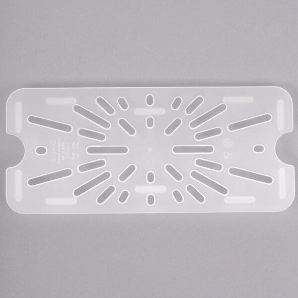 A translucent white plastic tray with holes.