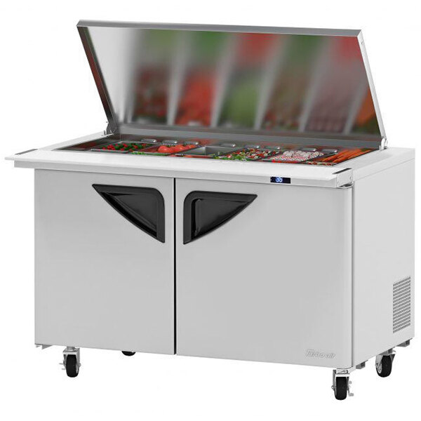 A Turbo Air Super Deluxe 2 door refrigerated sandwich prep table with flat lid.