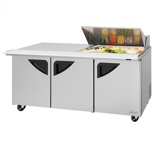 A Turbo Air stainless steel sandwich prep table with two doors on the left.