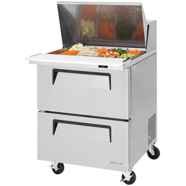 A Turbo Air Super Deluxe stainless steel refrigerator with two food-filled drawers.