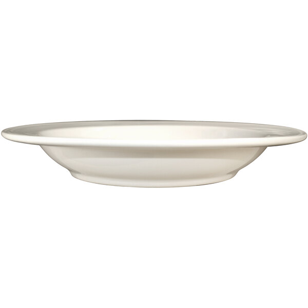 An International Tableware York ivory stoneware soup bowl with an embossed rim on a white background.
