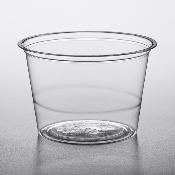 A clear Eco-Products compostable portion cup on a table.