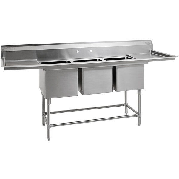 A stainless steel Eagle Group three compartment commercial sink with two 18" drainboards.