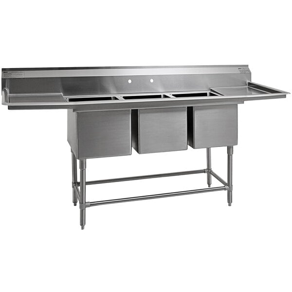 An Eagle Group stainless steel three compartment commercial sink with drainboards.