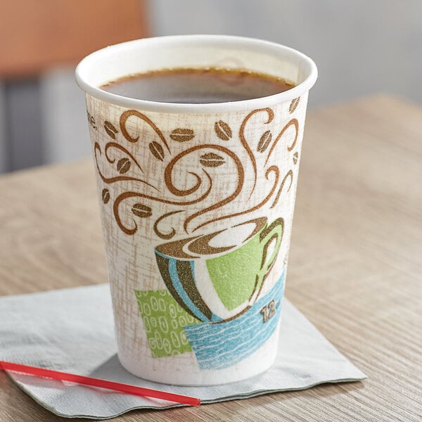 A Dixie paper coffee cup on a counter.