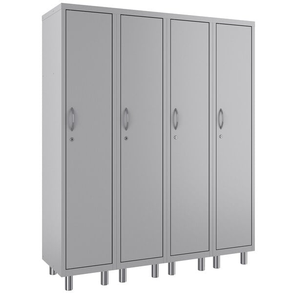 A row of four Hirsh Industries platinum metal tall lockers with doors.