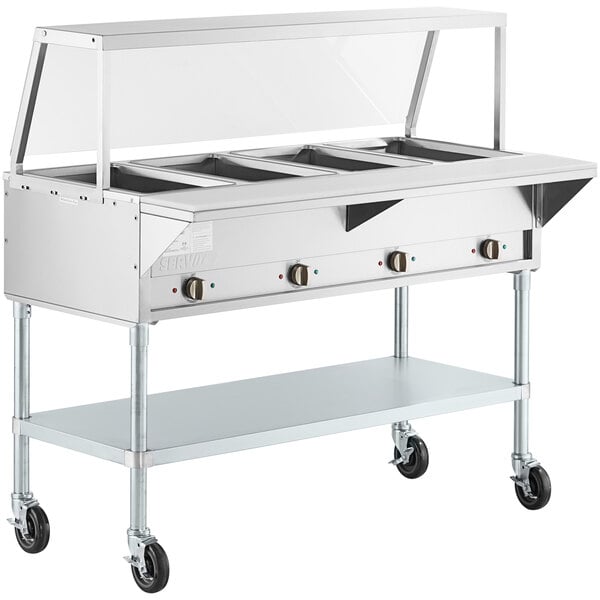 A ServIt open well stainless steel electric steam table on casters.